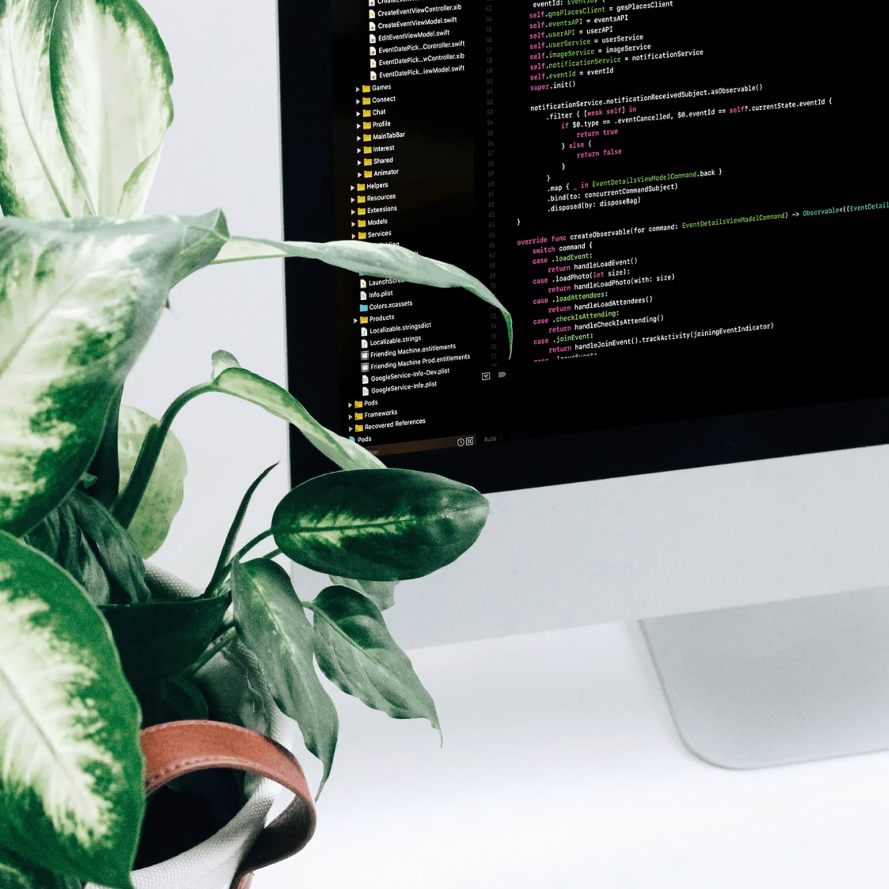 Apple monitor on white deck