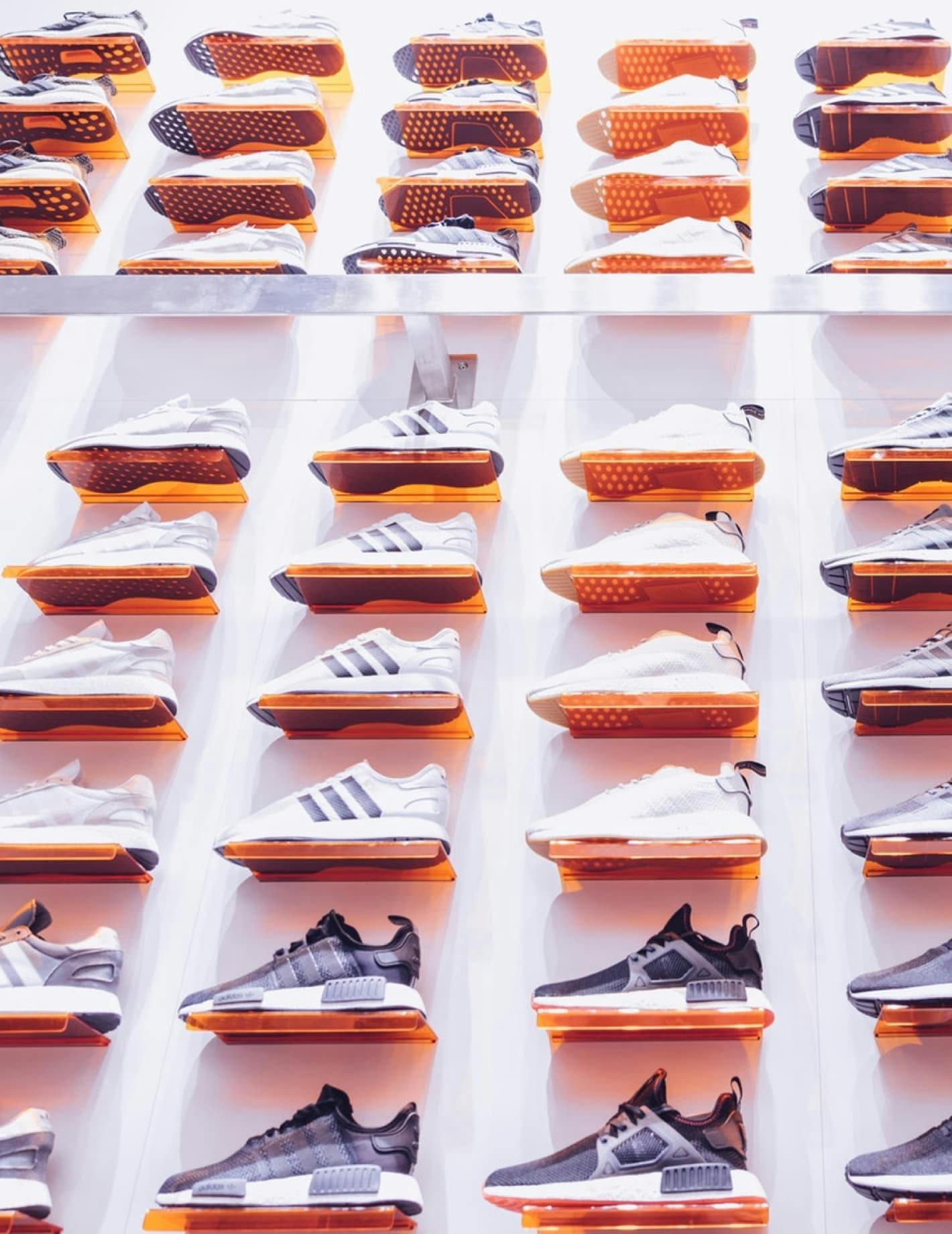Rows of sneakers on a wall