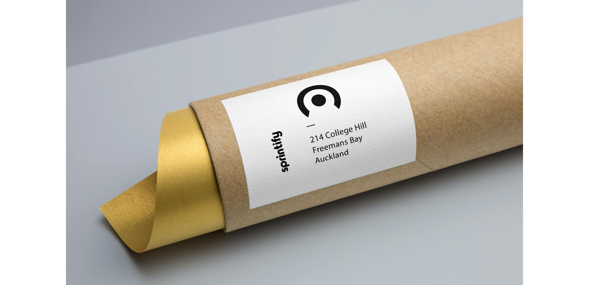 Mock-up showing Sprintify branded sticker on stationery 