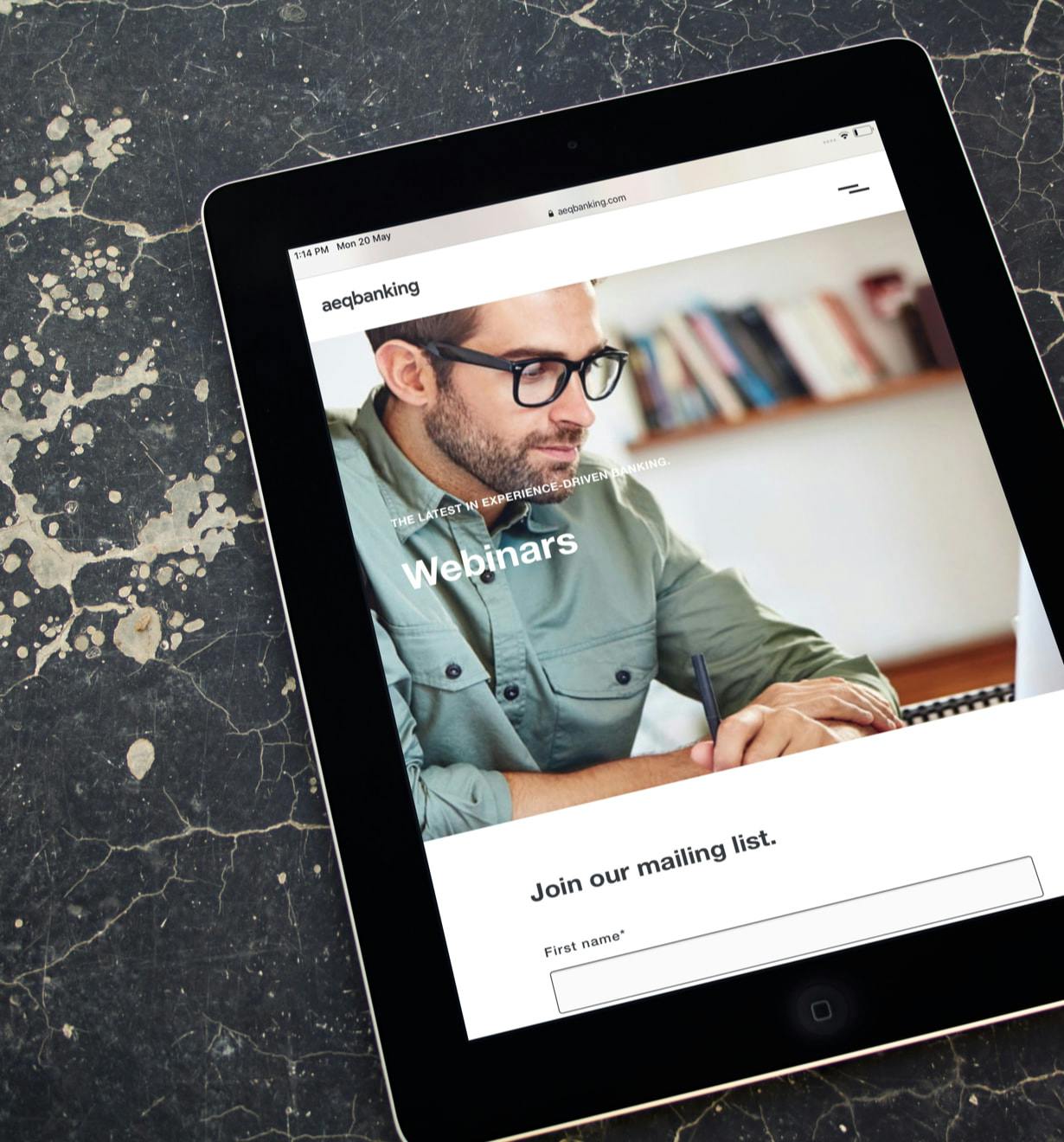 Hero image showing a Aequilibrium webinar in an ipad on a granite surface