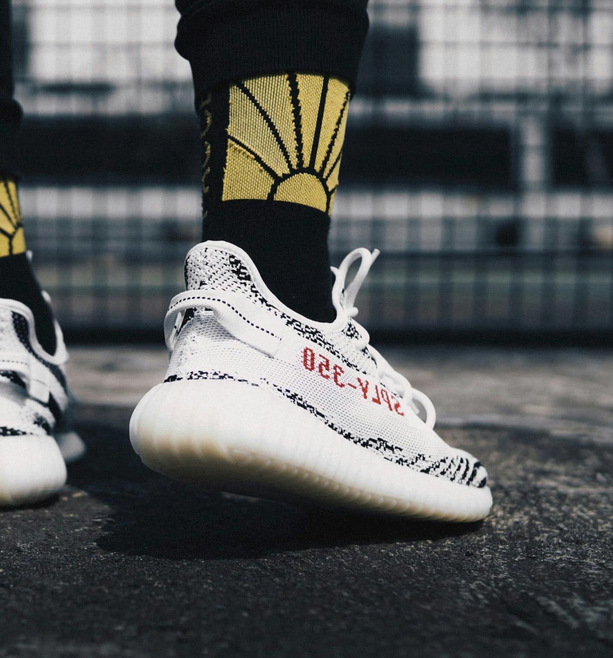 Hero image showing Yeezy sneakers on feet