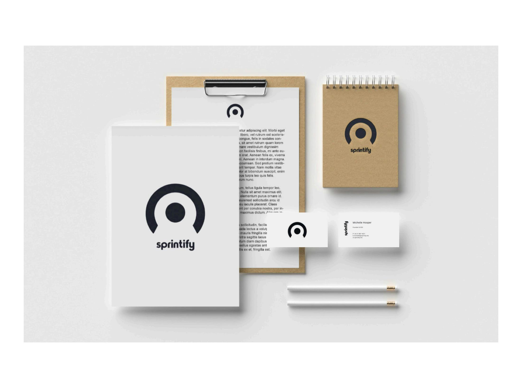 The final Sprintify logo on stationery mock-ups