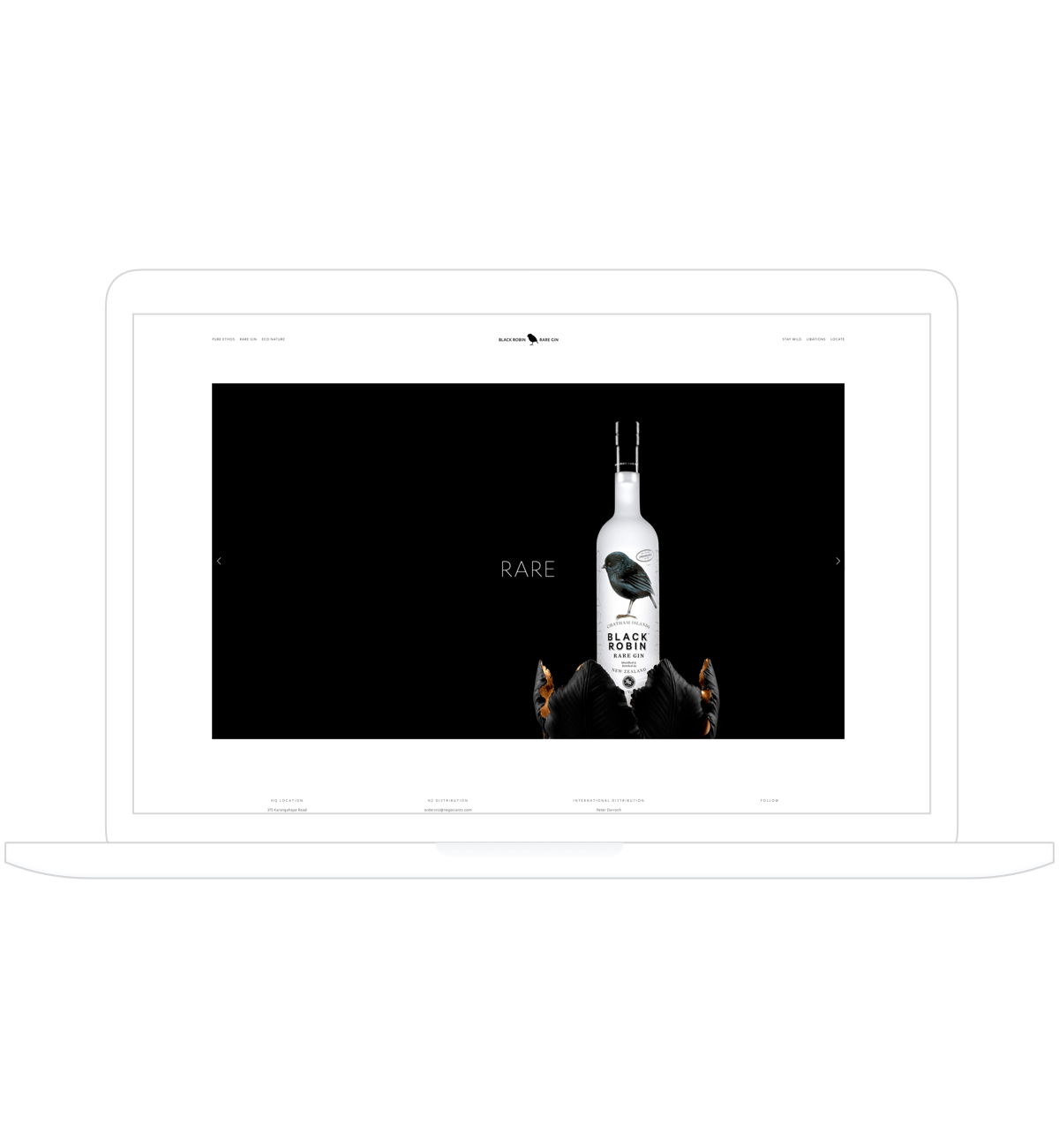 Mock-up laptop displaying Black Robin Gin website