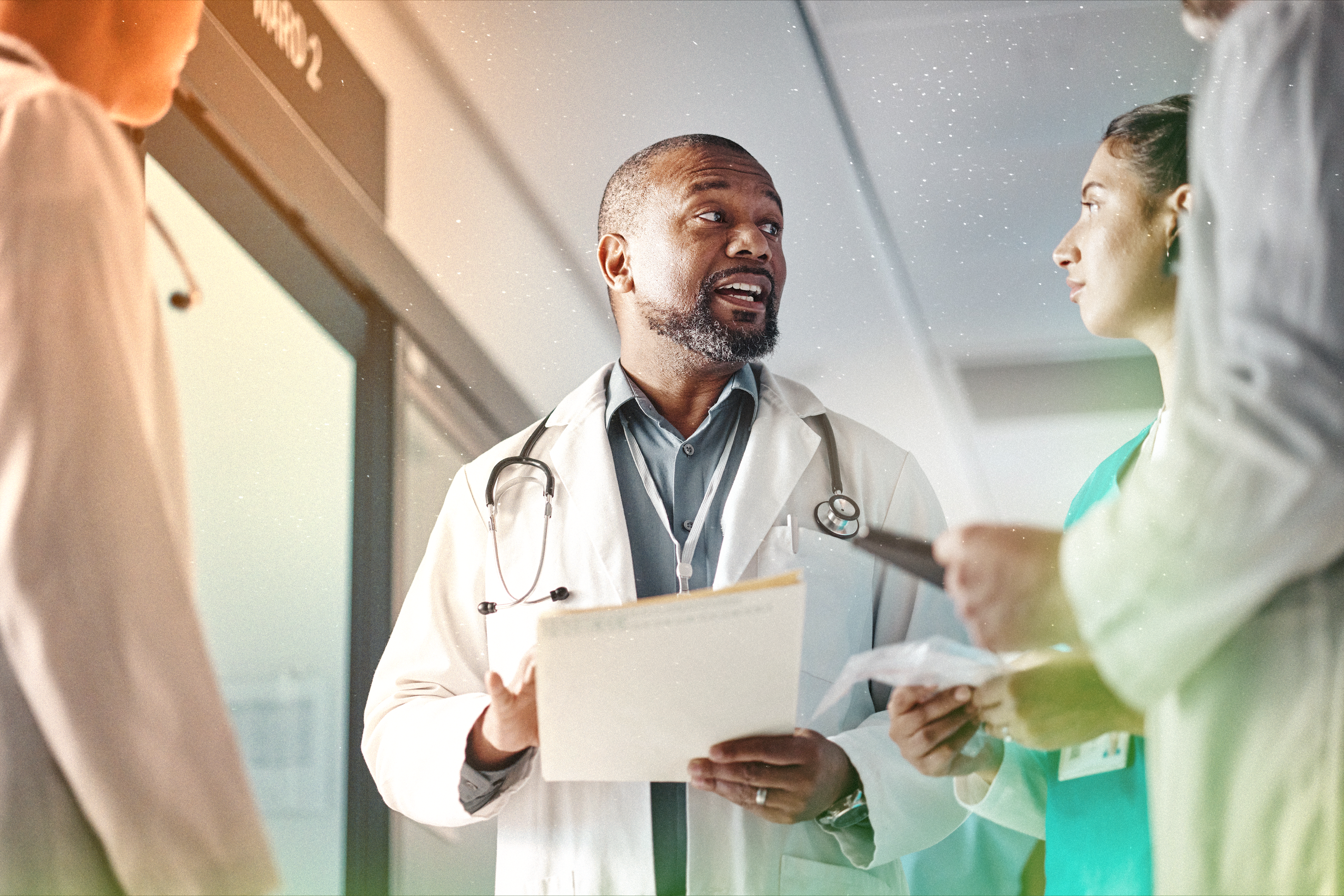 doctors speaking with clipboard
