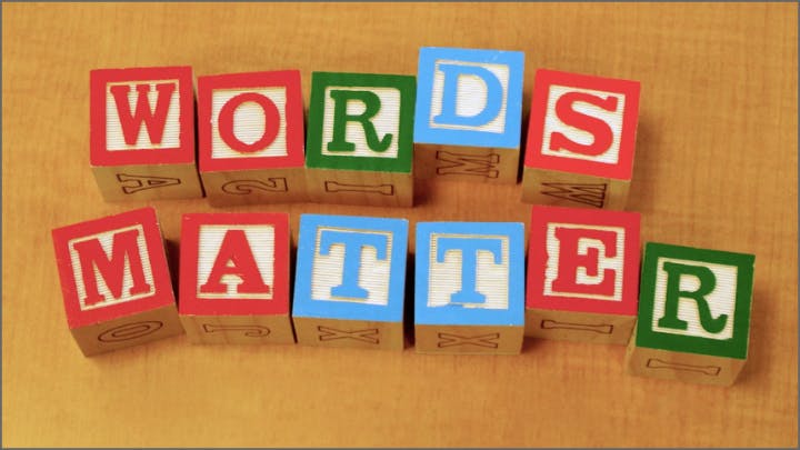 Photo of toy blocks spelling out "Words Matter"