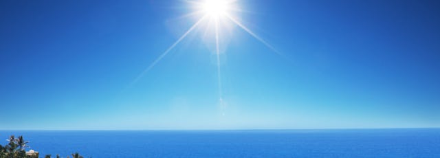 Photo of sun over ocean