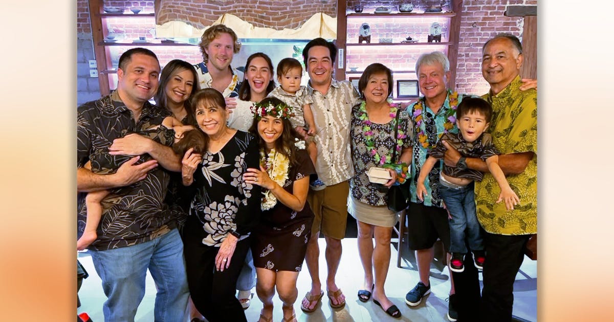 Photo of Nicole Velasco and her family at a birthday celerbation