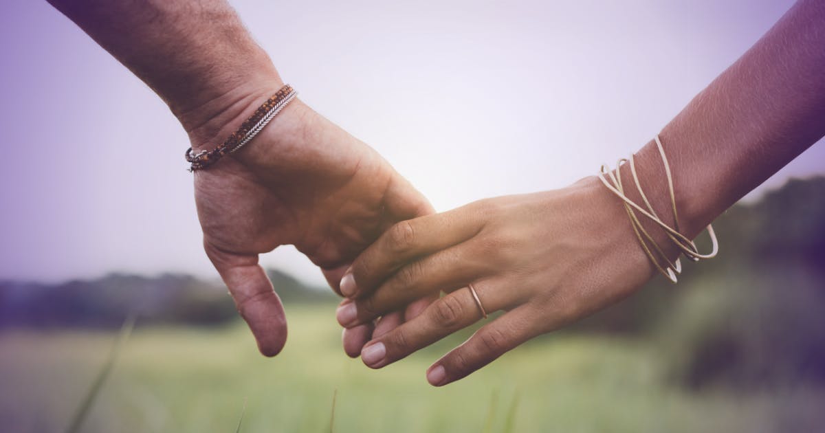 Photo of a couple holding hands with text that says "Healthy Relationships"