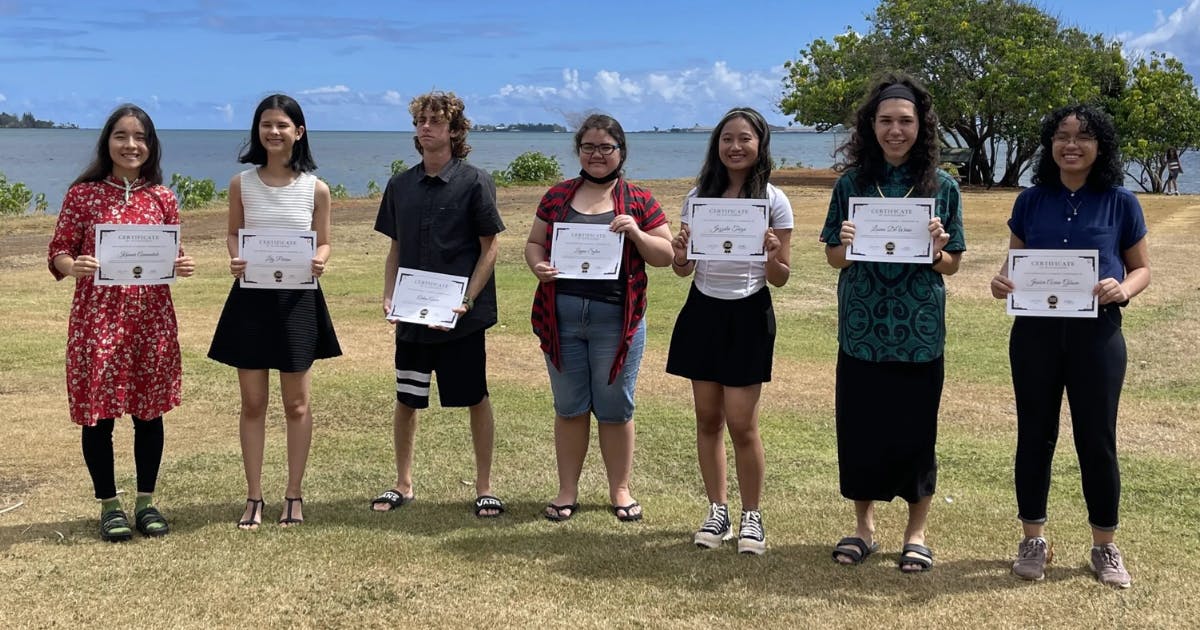 Photo of high school students receiving award recognitions