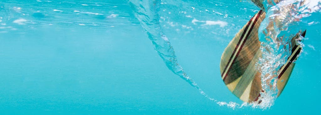 Photo of paddle under water with motion