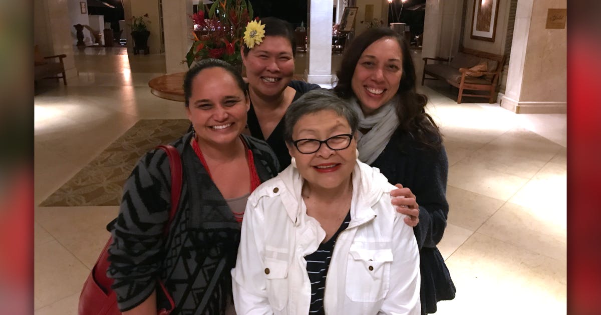 Photo of Cheryl Ka‘uhane Lupenui, one of her mentors, Puanani Burgess, and Pua's daughters.