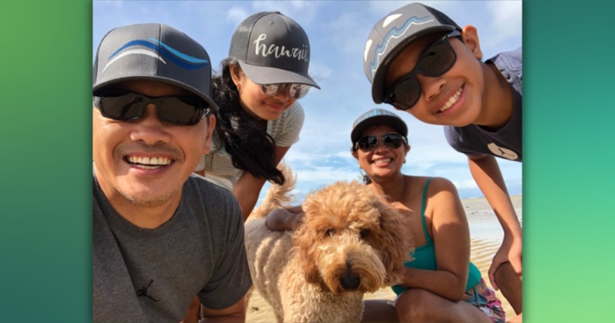 AJ with his family at the beach
