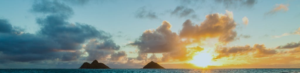 Photo of sunrise over ocean horizon