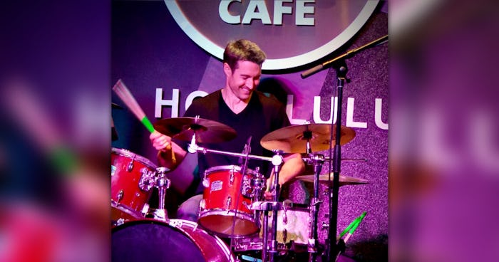Photo of Jeff Mikulina playing drums