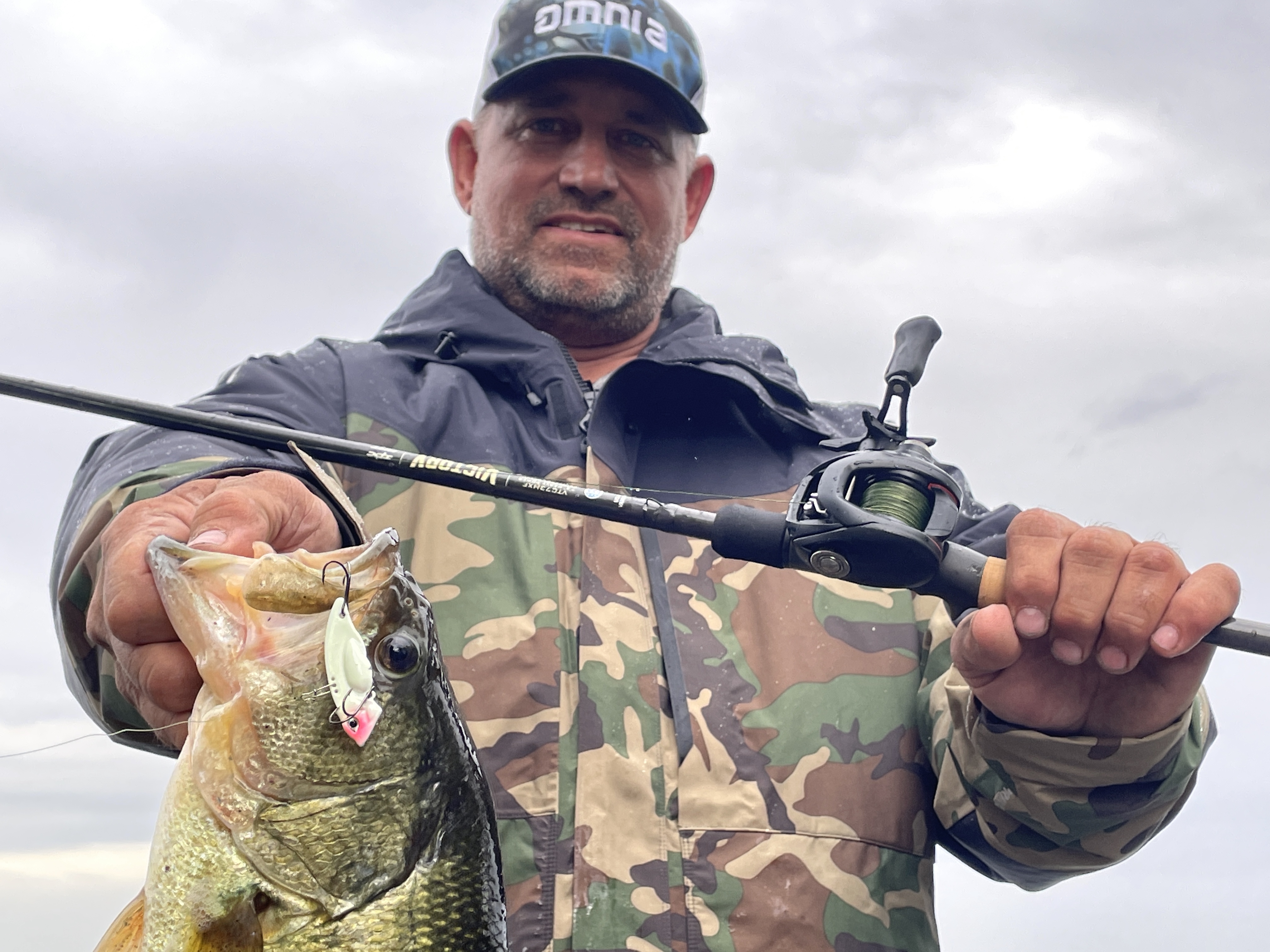 Nick Cousvis catches a largemouth bass on a blade bait