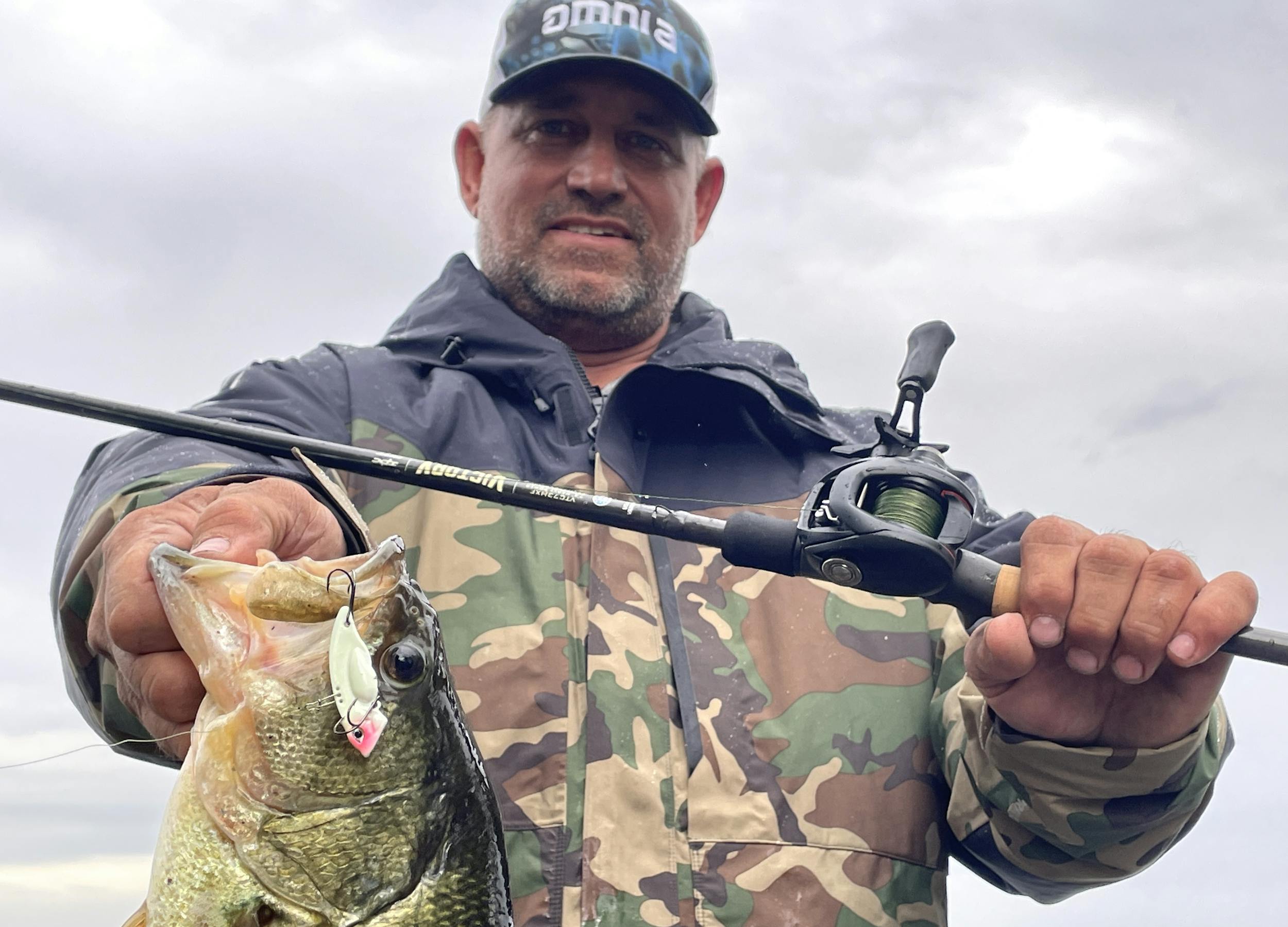 Nick Cousvis catches a largemouth bass on a blade bait
