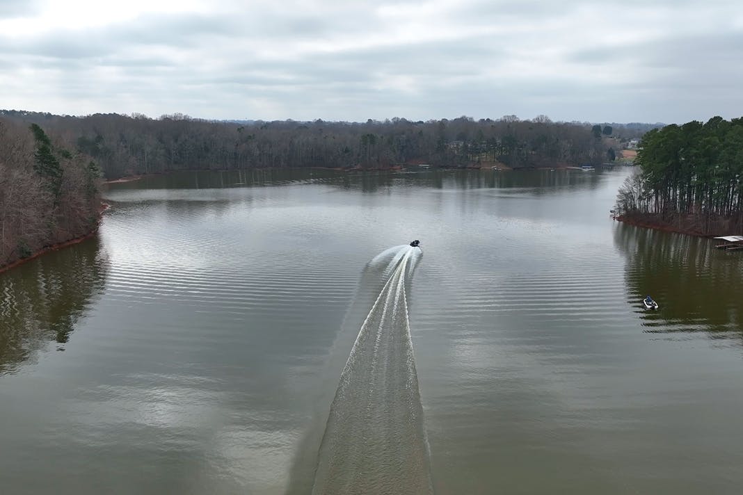 Bass boat running down a southern US reservoir
