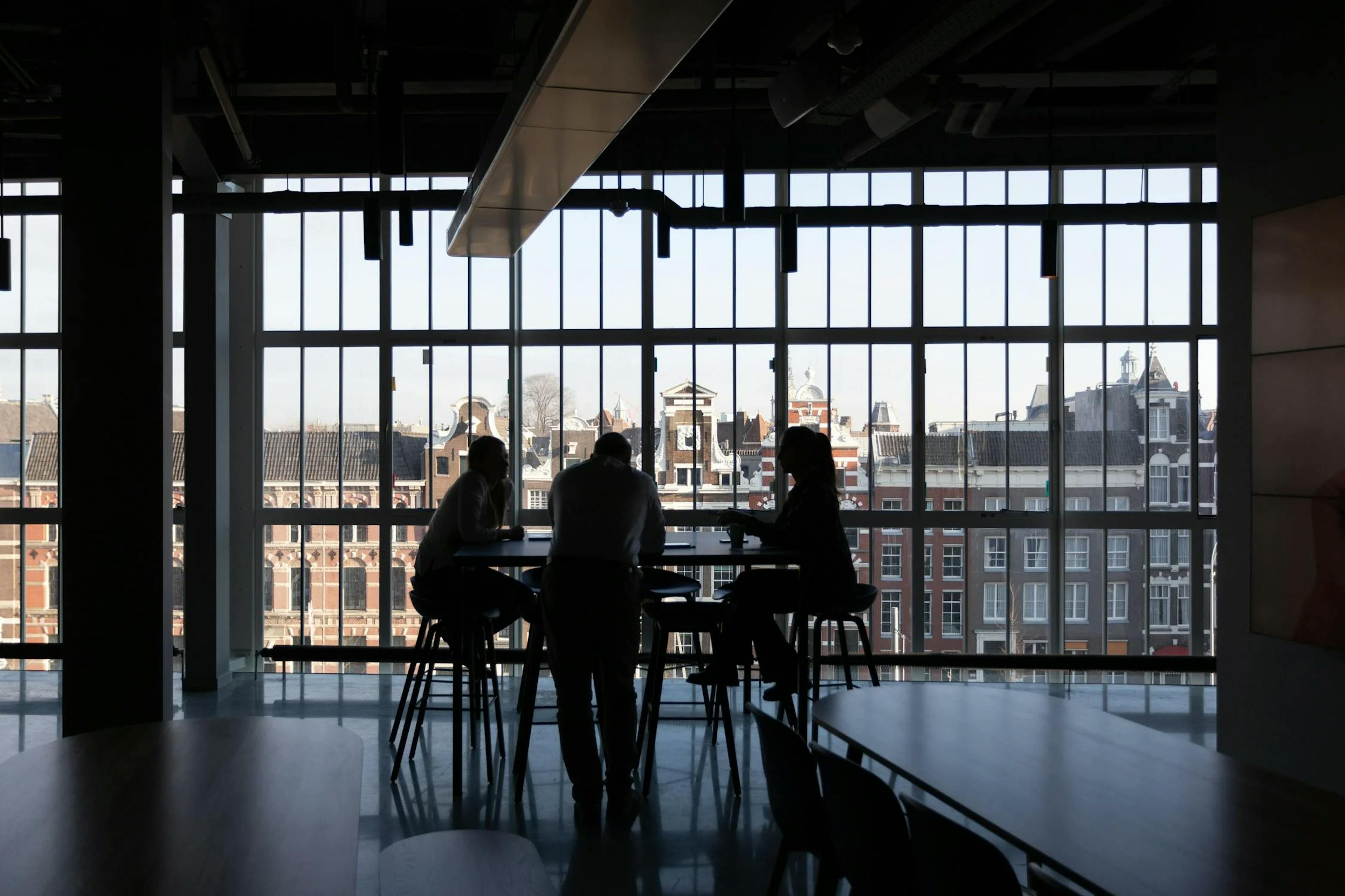image of people sitting in a studio apartment