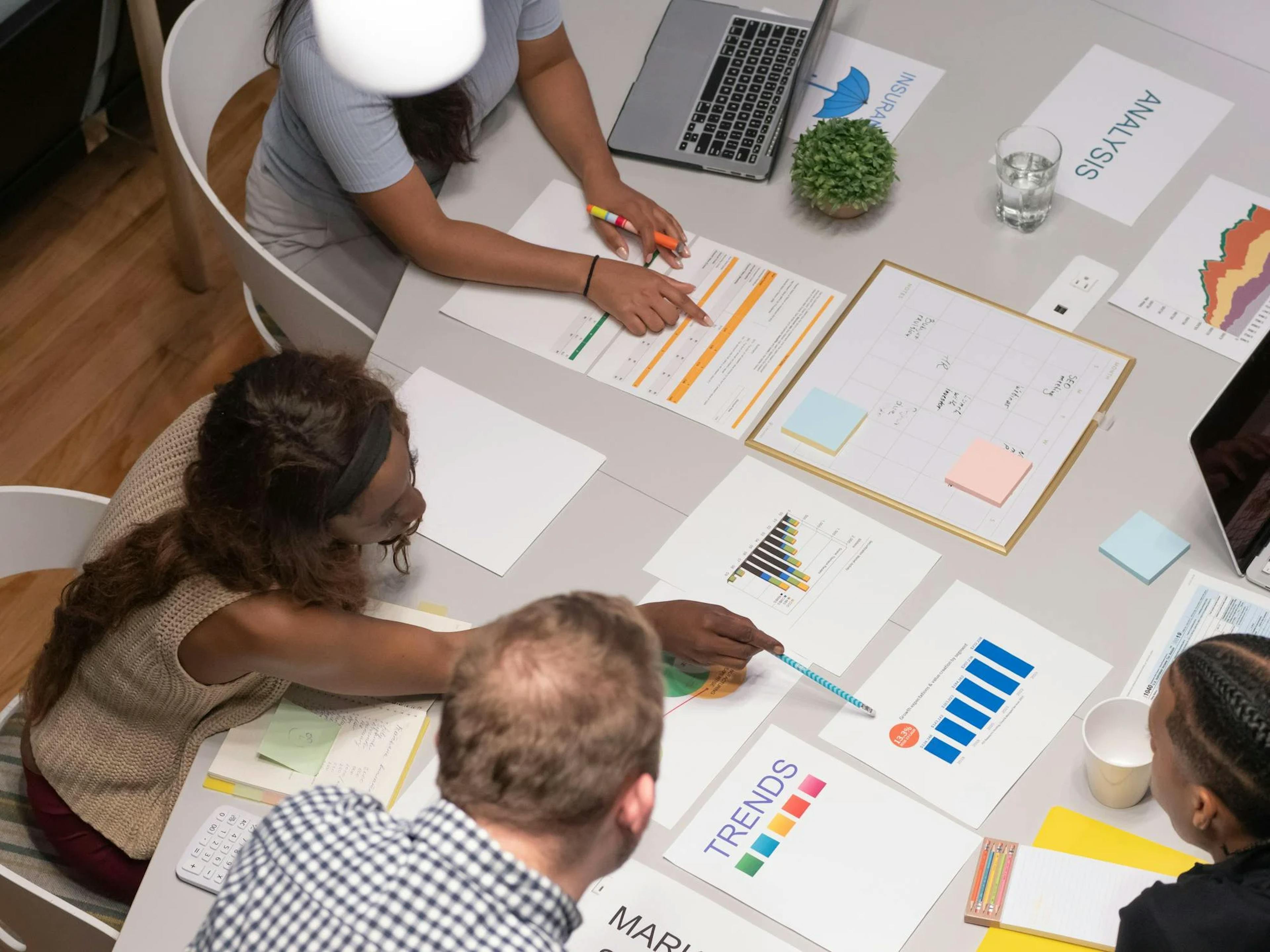 image of a panel discussing something over the board