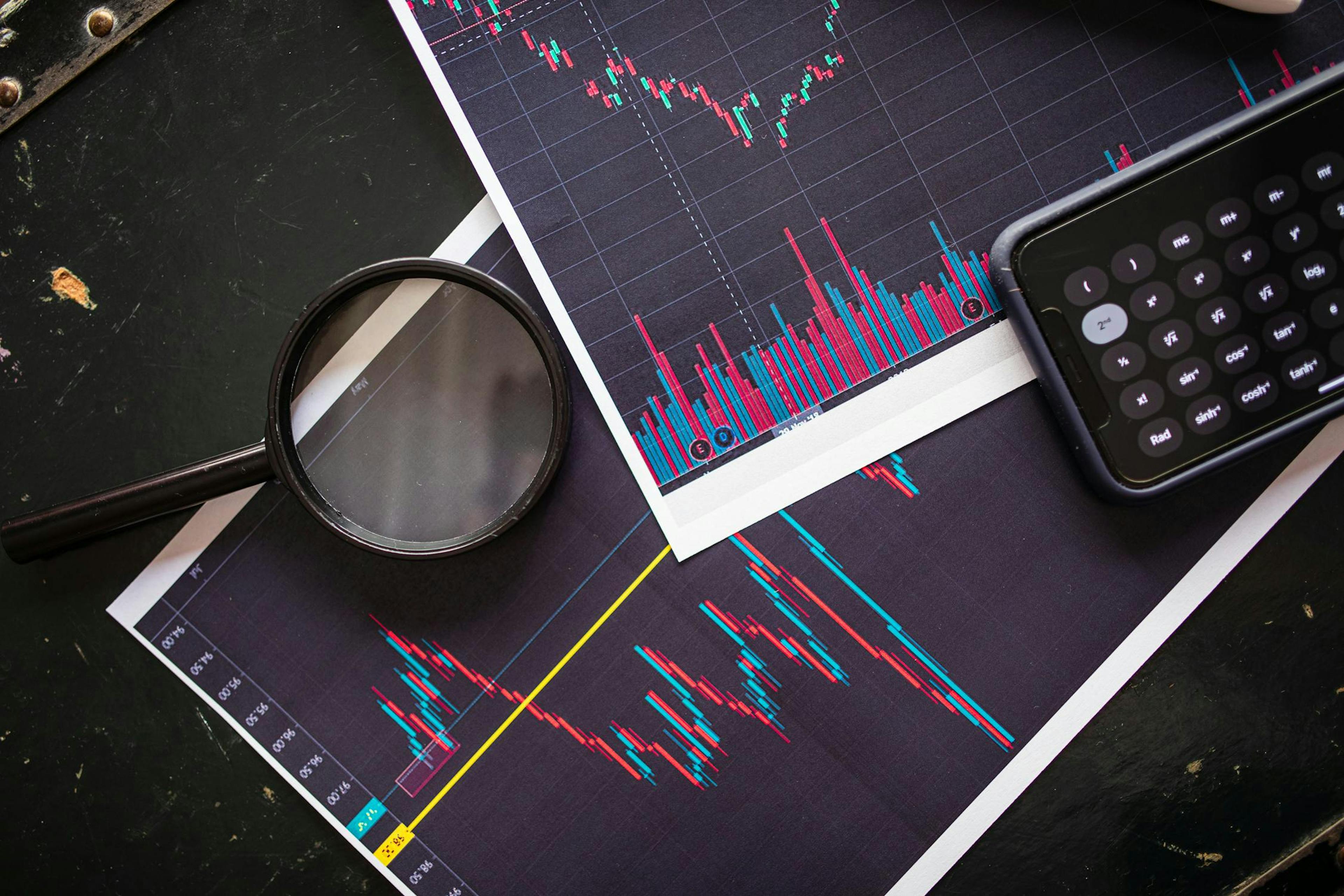 image showing some charts and a glass