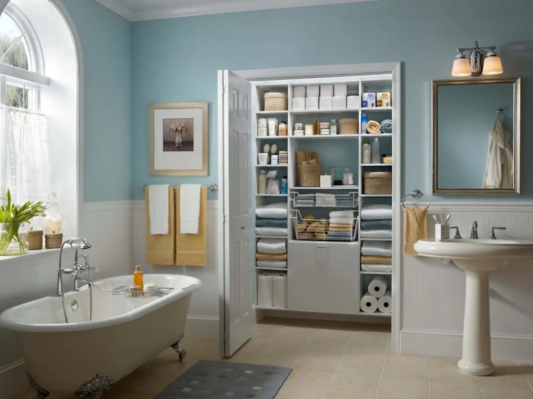 Linen storage cabinets in a classy bathroom.