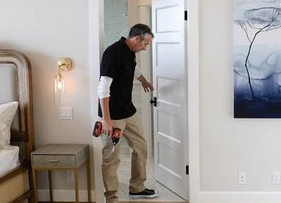 installer installing a door
