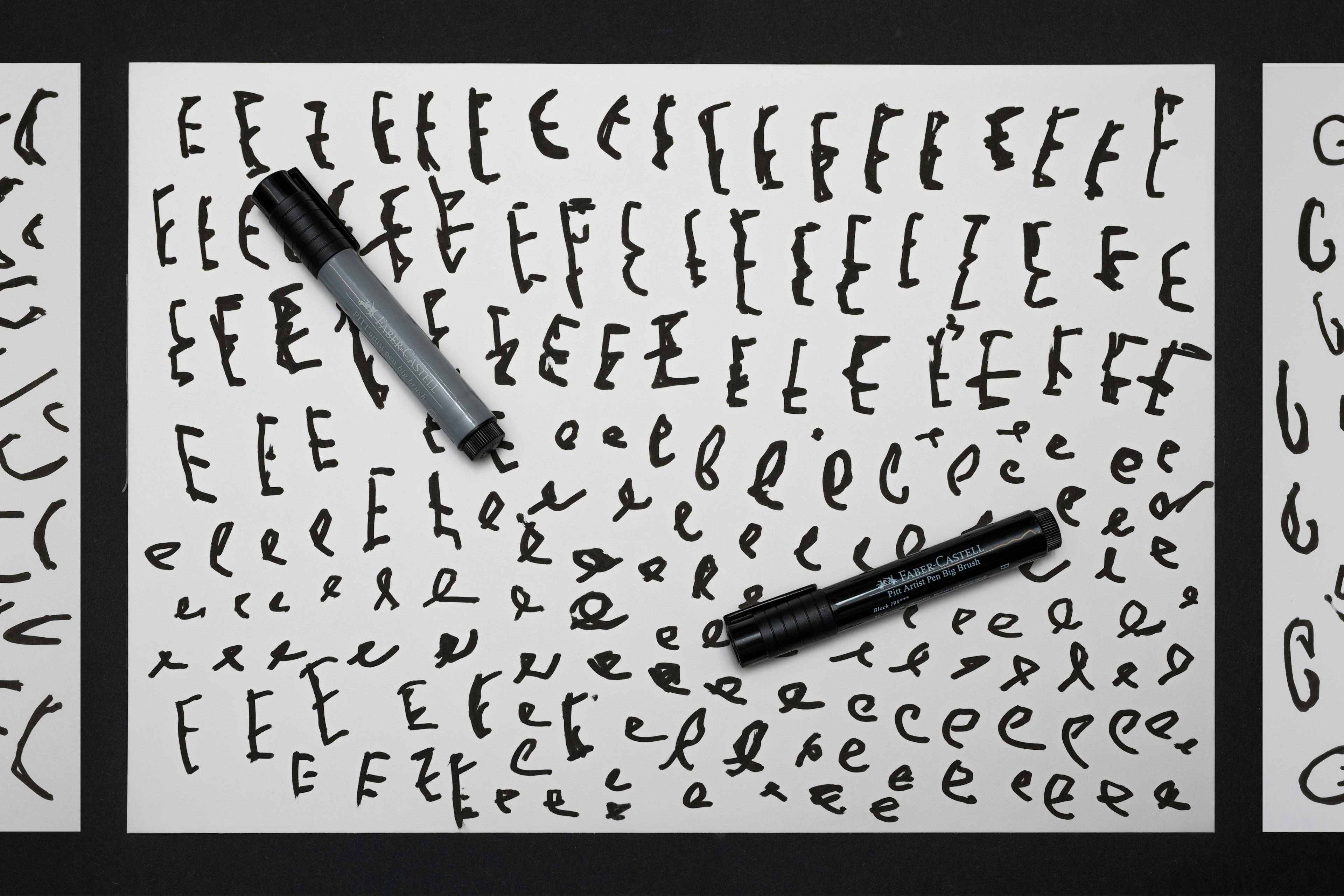 Multiple hand drawn characters that formed Lost Village's new typeface.