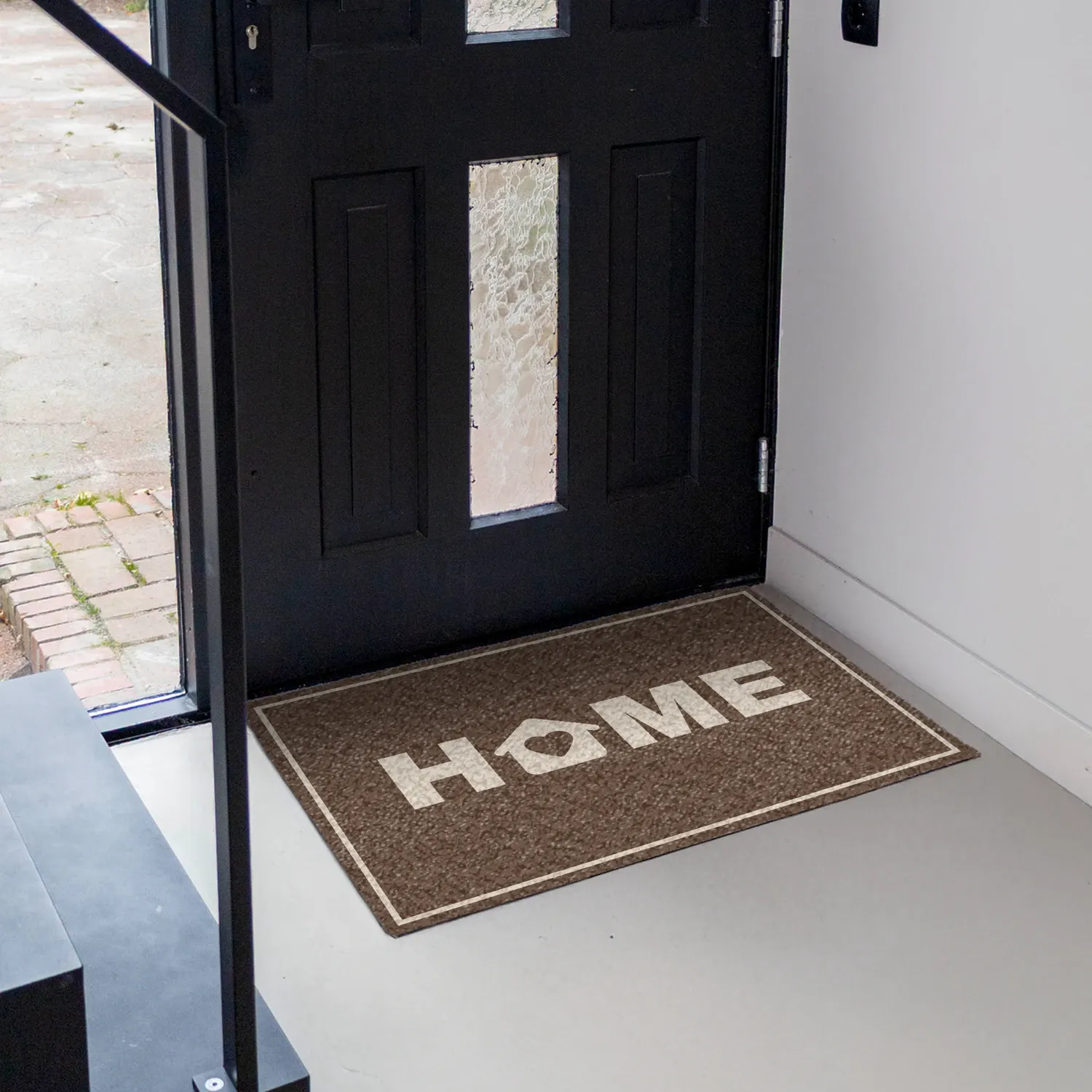 Deurmat bruin met de tekst home erop