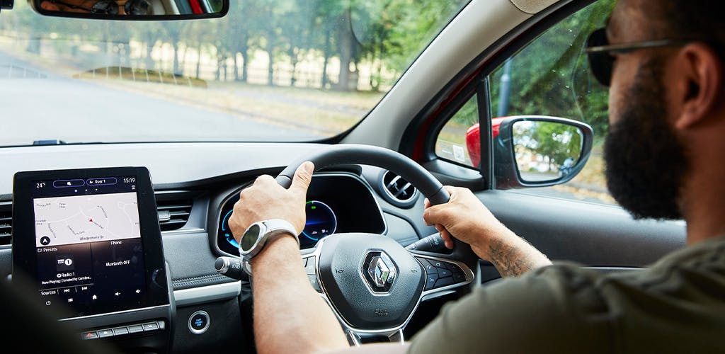 Man driving a Renault Zoe