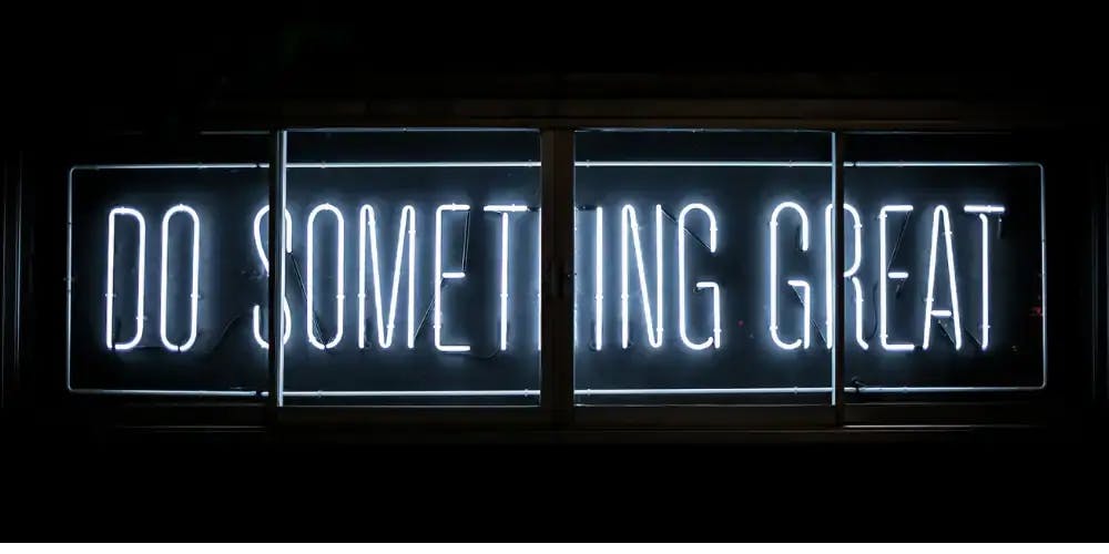 A glowing text including content of 'Do Something Great'
