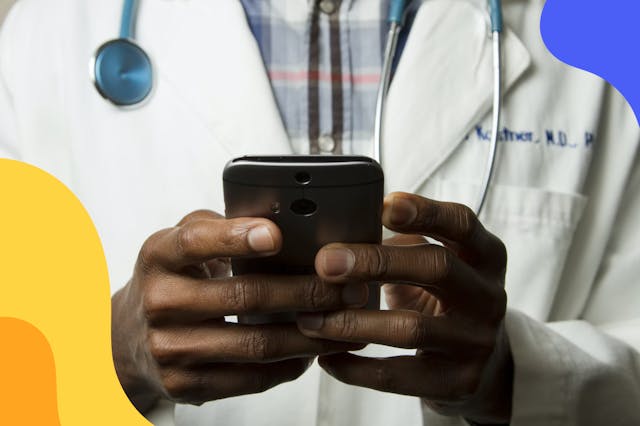 Doctor holding iPhone