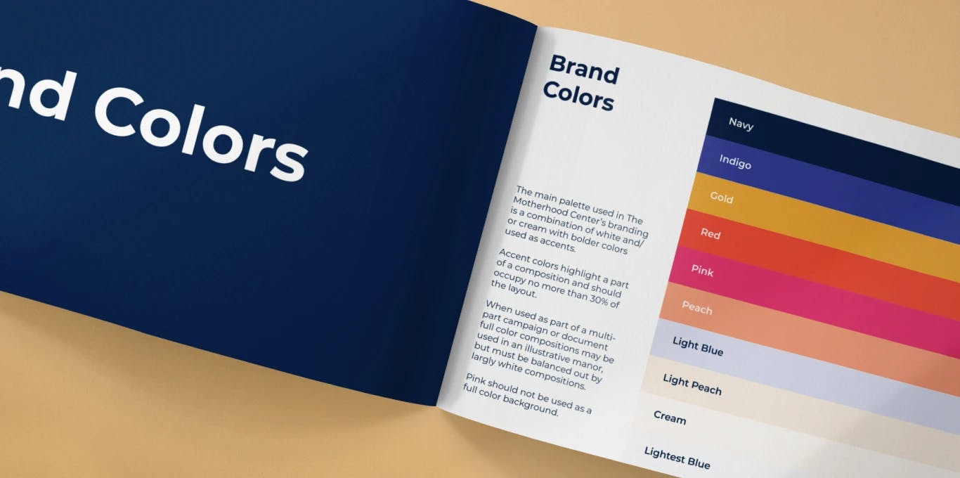A spread of The Motherhood Center Style Guide opened up to the "Brand Colors" page.