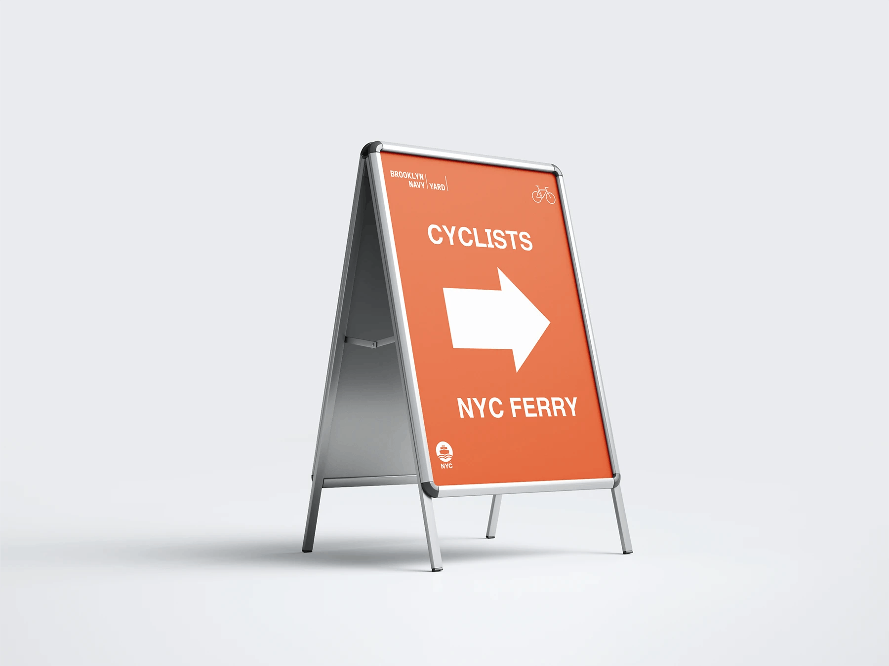 Signage for Brooklyn Navy Yard directing cyclists to the NYC Ferry
