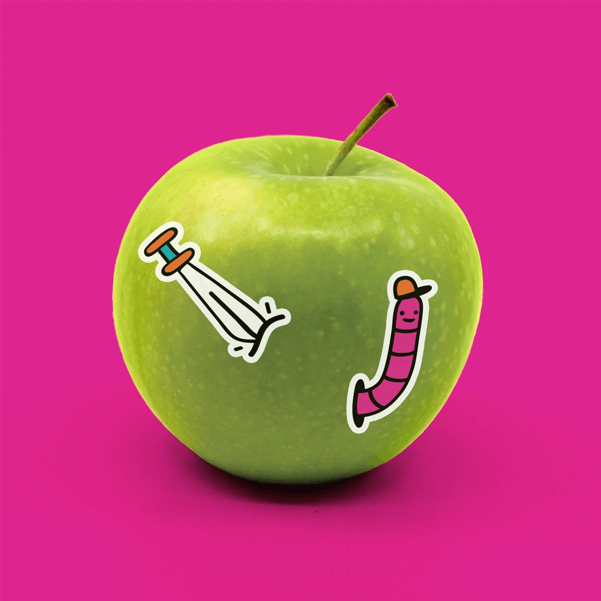 Green apple with edible stickers