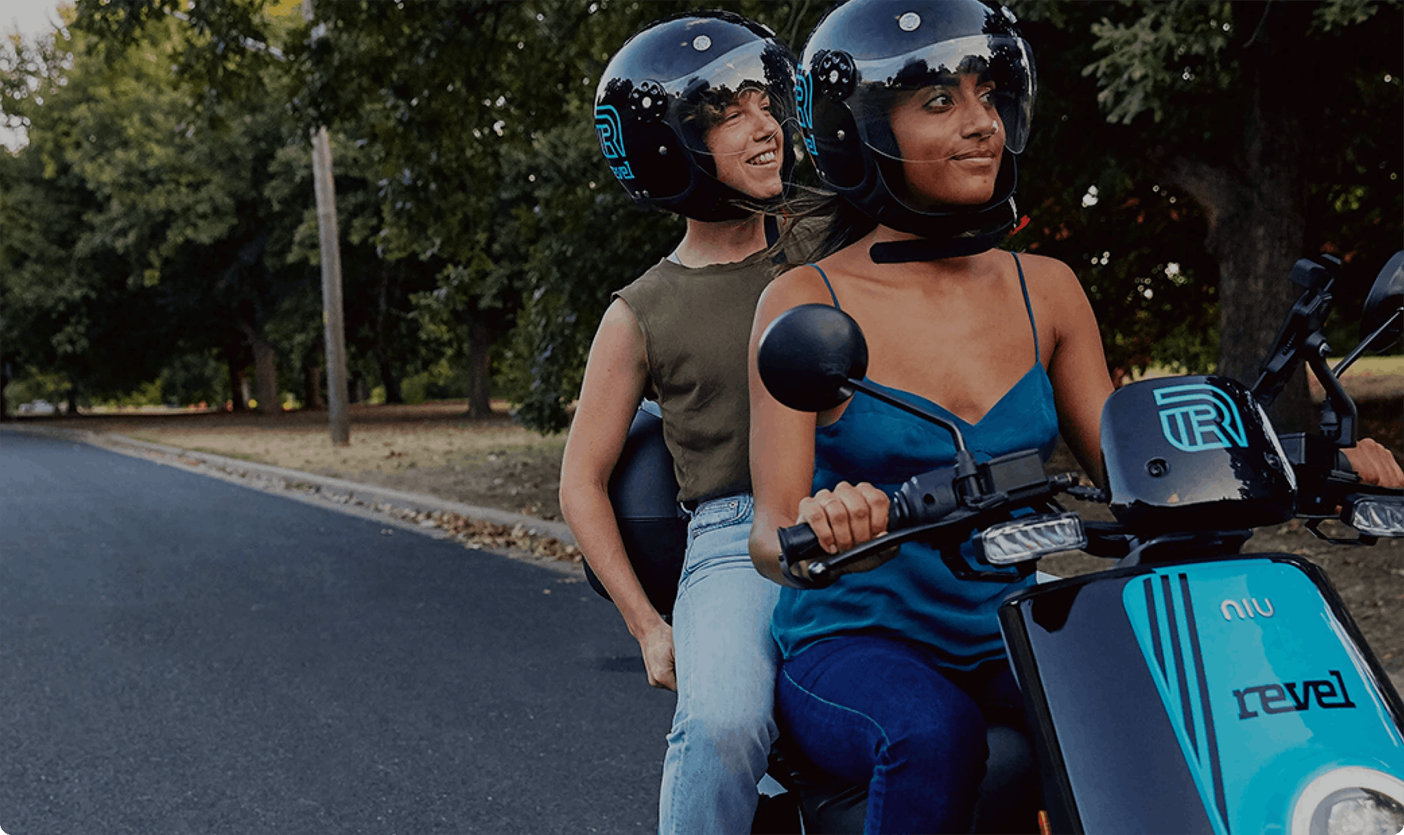 Revel - two people on scooter share