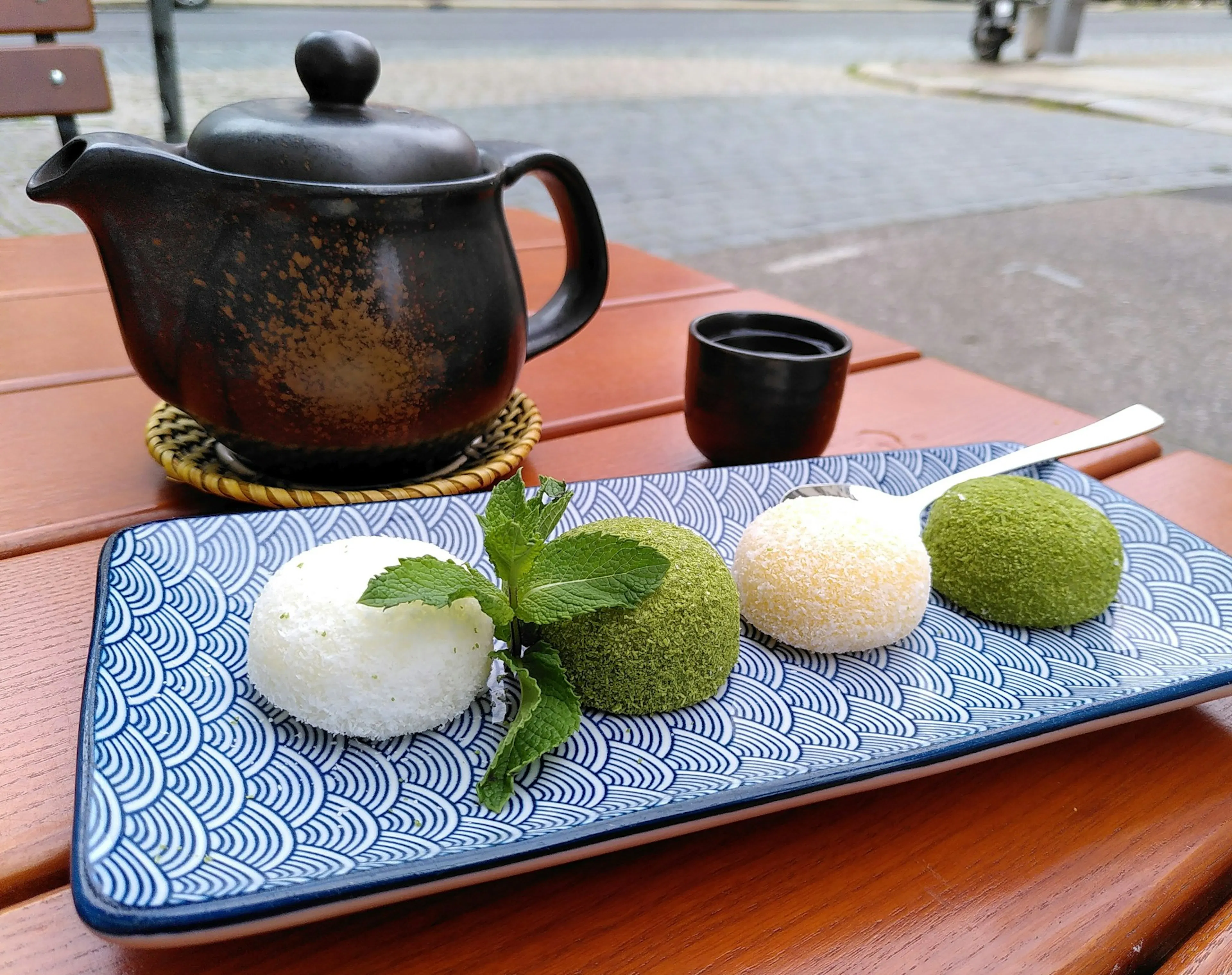 Japanese teapot and plate with mochi