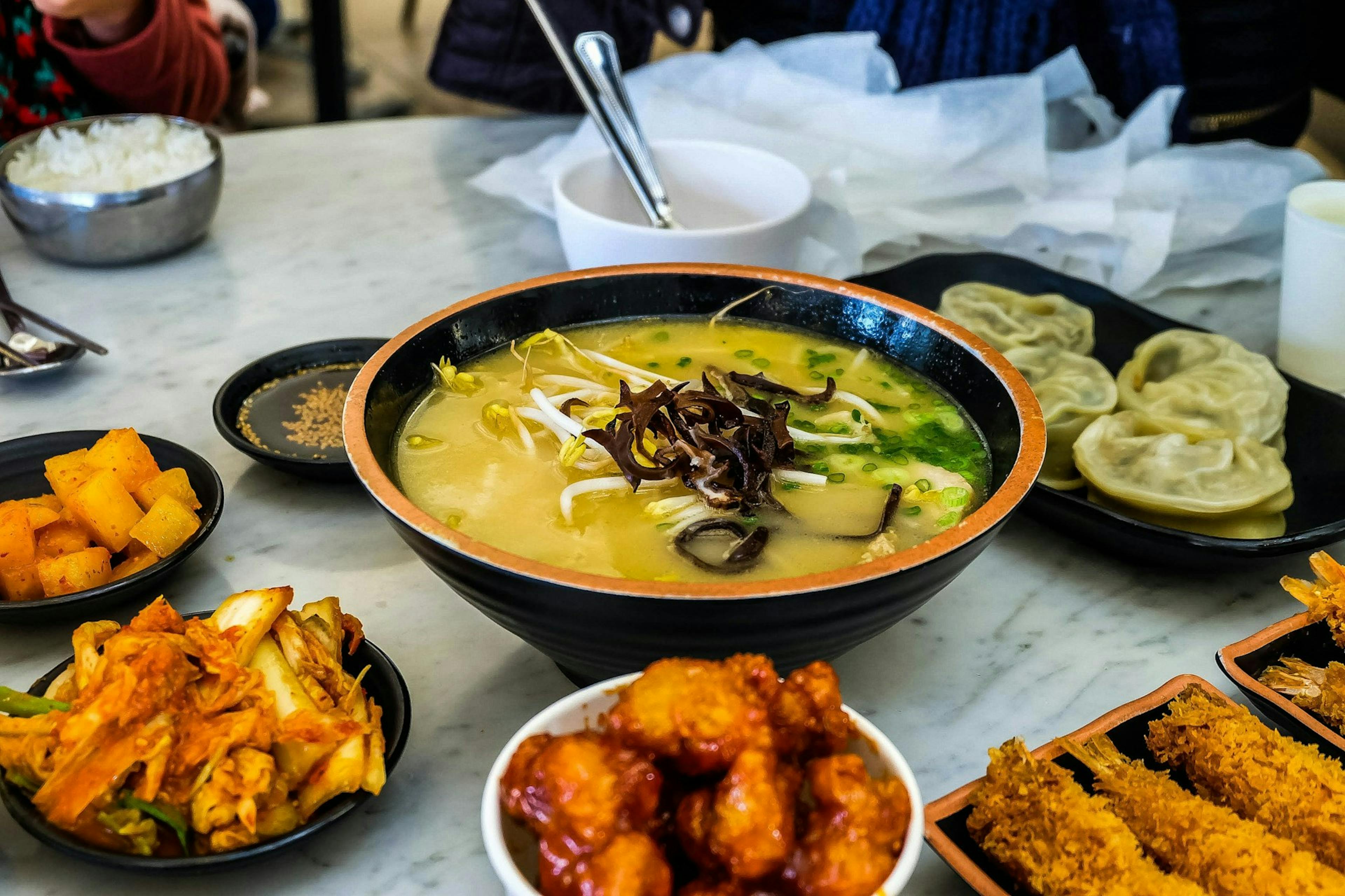 Korean dinner party food on a table