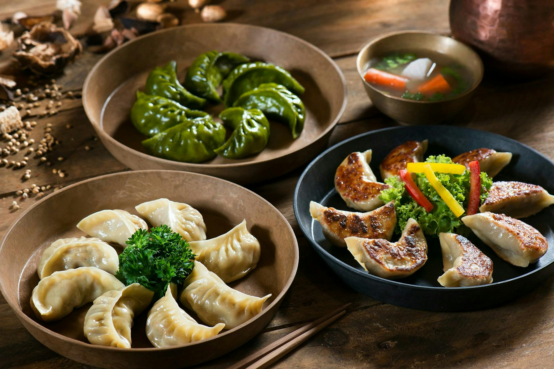 Plates of different kinds of gyoza