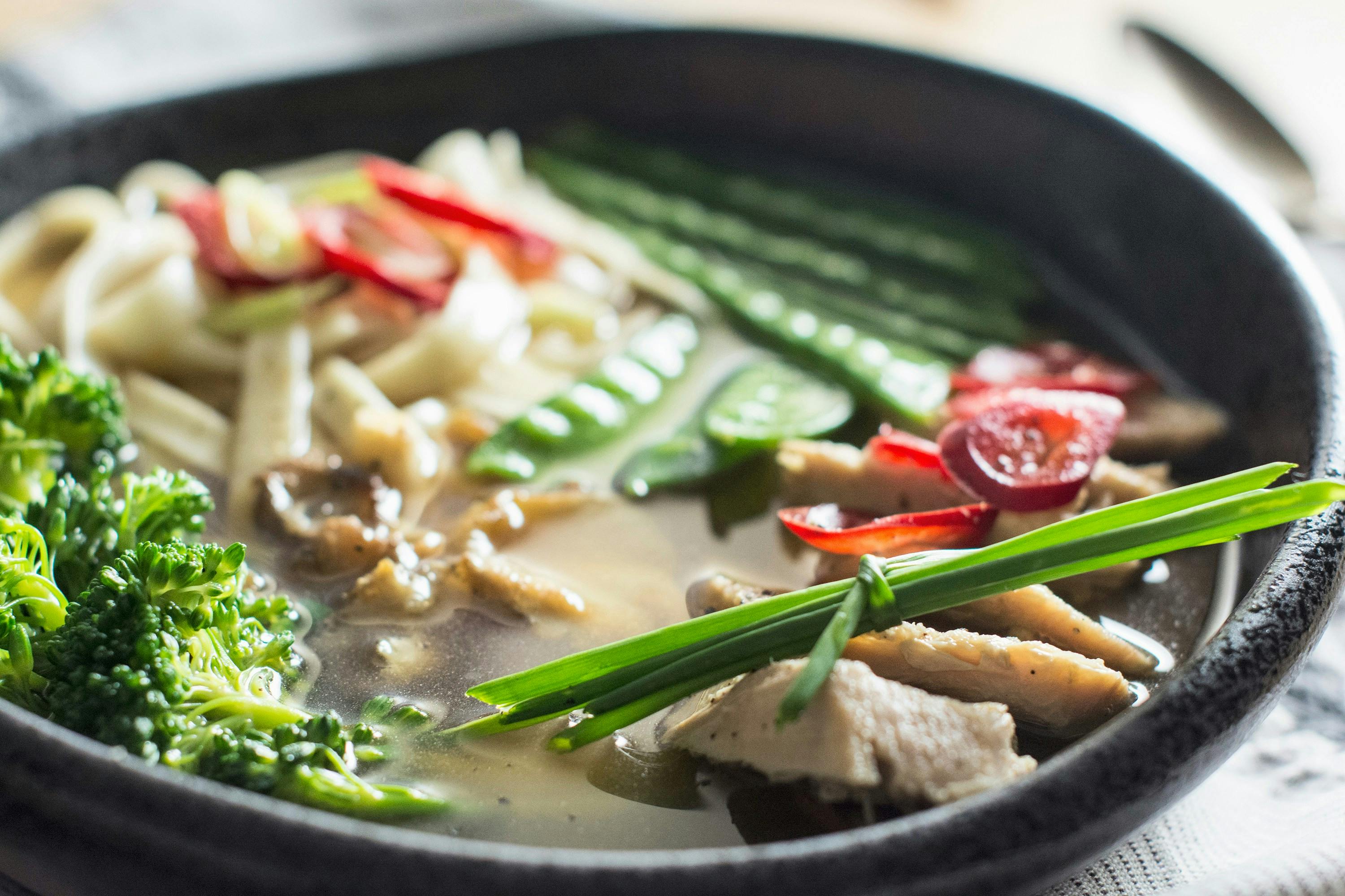 Chinese soup with chicken and vegetables