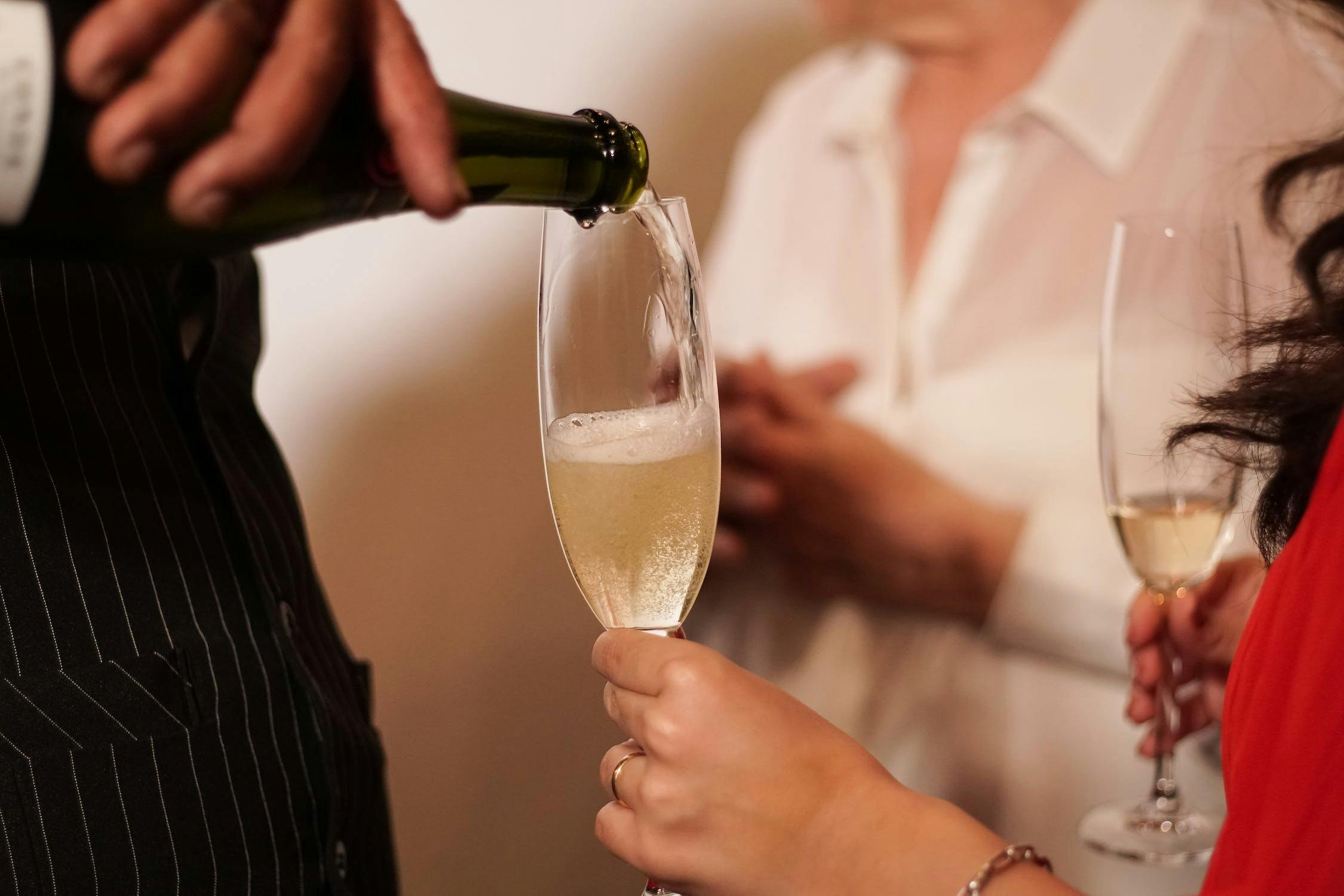 sparkling sake being served