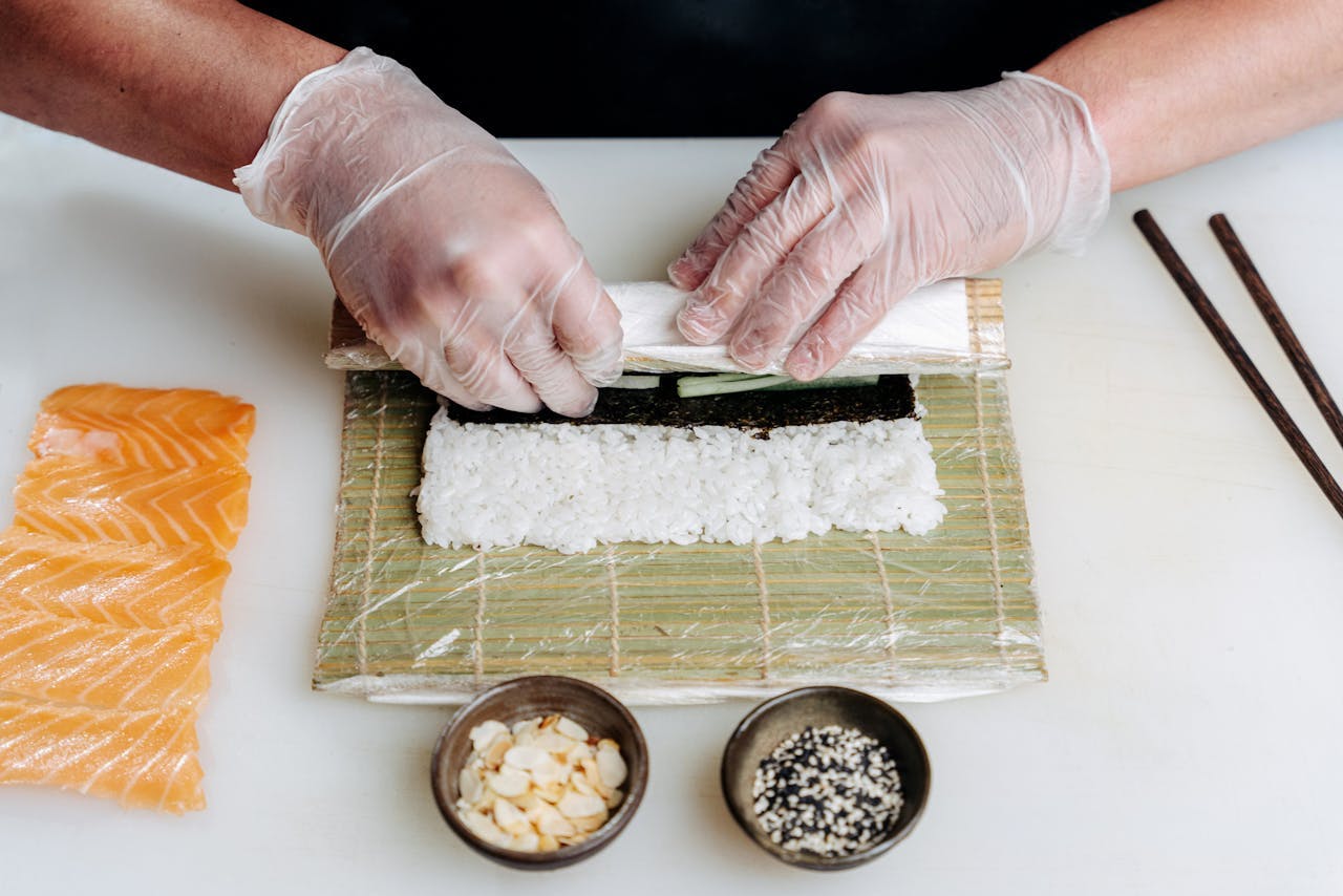 rolling sushi on a mat