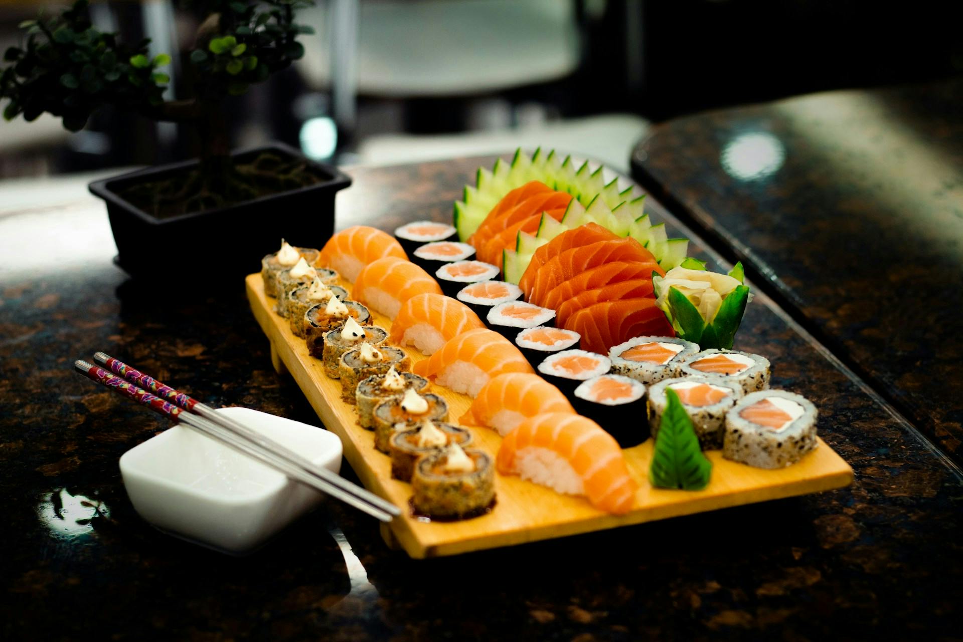 various types of sushi on a board