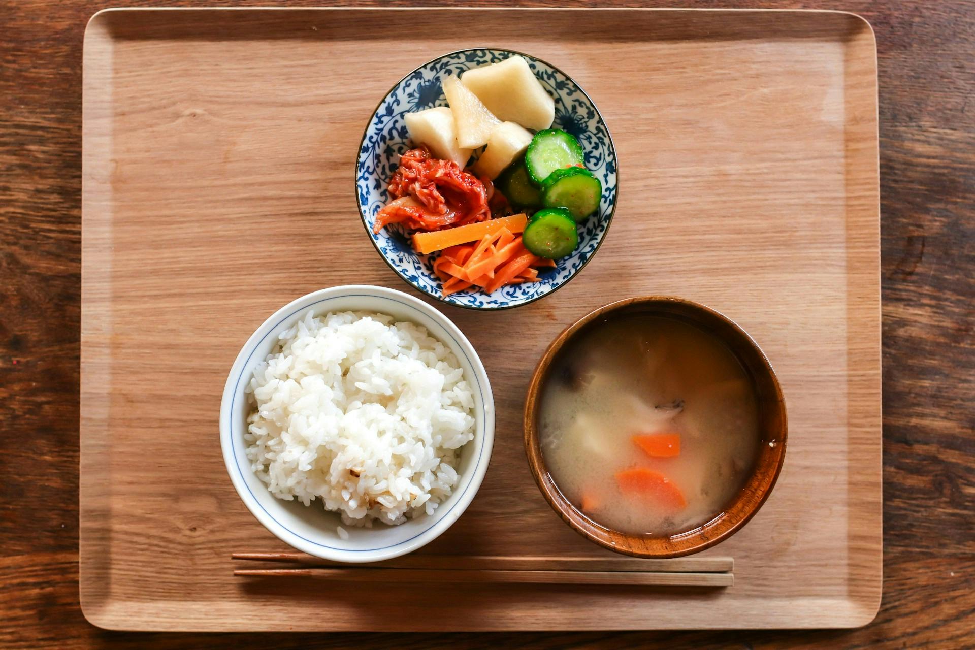 Sticky rice bowl and two other bowls
