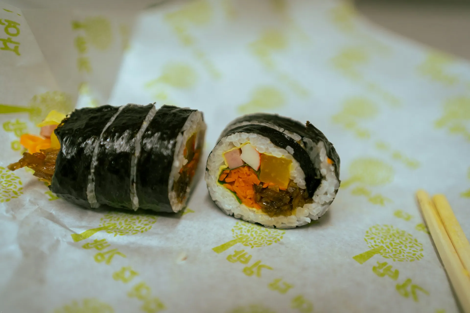 Takuan maki sushi roll cut up