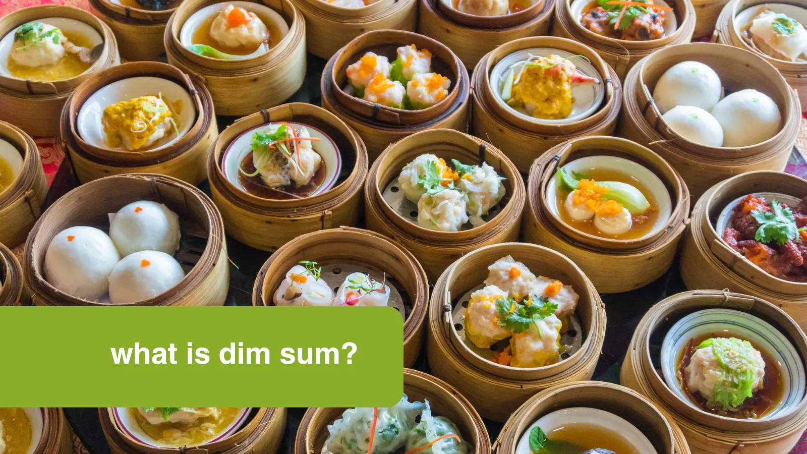 Various bamboo steamers full of different dim sum