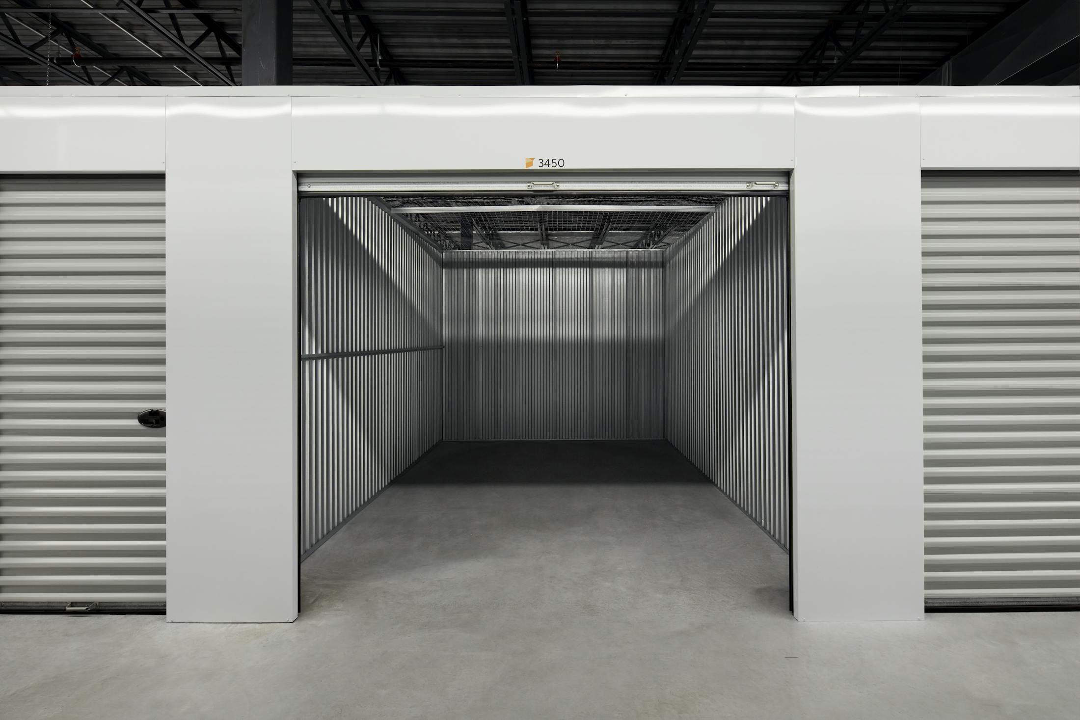 Interior of a self storage unit, each equipped with a secure door and locking system.