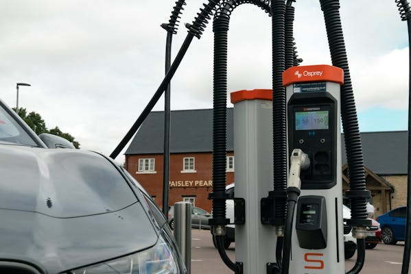 Car charging at Osprey's new ultra-rapid charging hub at the Paisley Pear, Brackley.