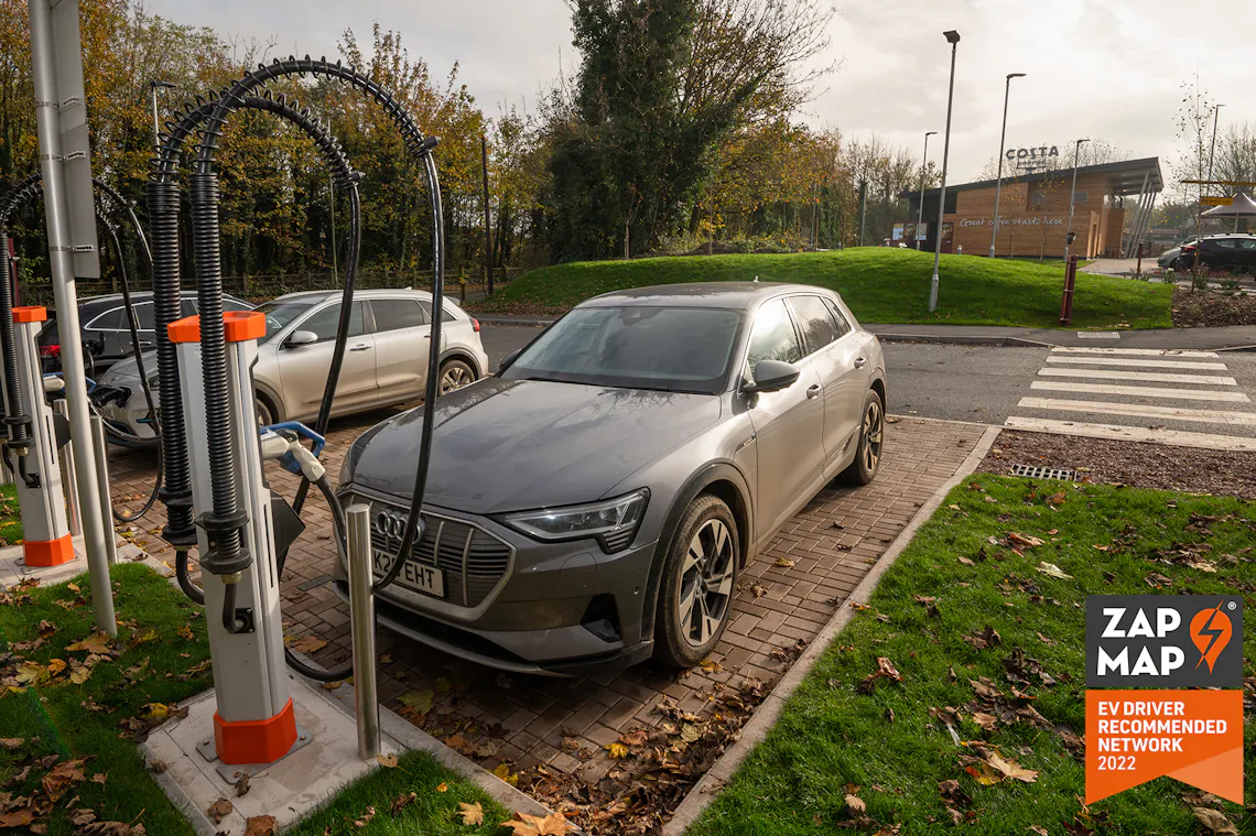 A photograph of a high-powered Osprey charging hub with a 'Zap-Map EV driver recommended network' badge on top.