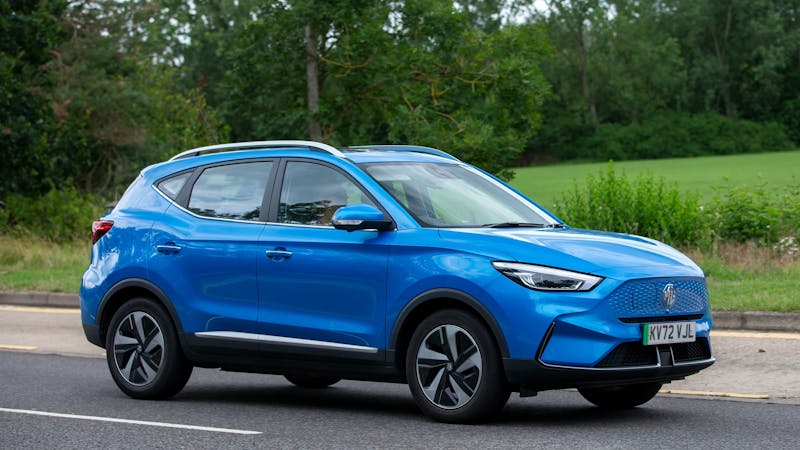 Blue MG ZS EV electric car travelling on an English road