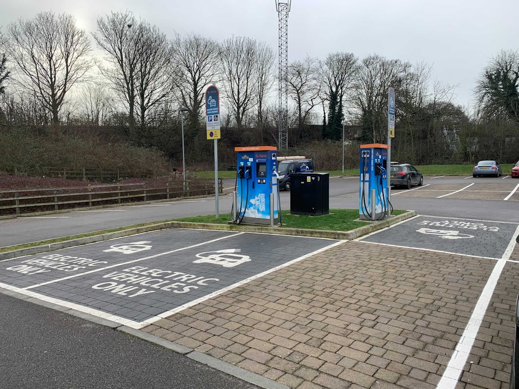 Two 50kW Osprey branded charging stations in a carpark.